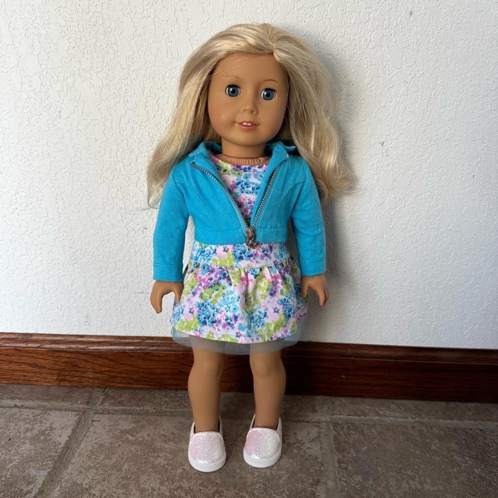 American Girl Doll with blonde hair and blue eyes